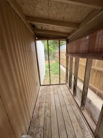 a view of backyard with wooden floor and outdoor space