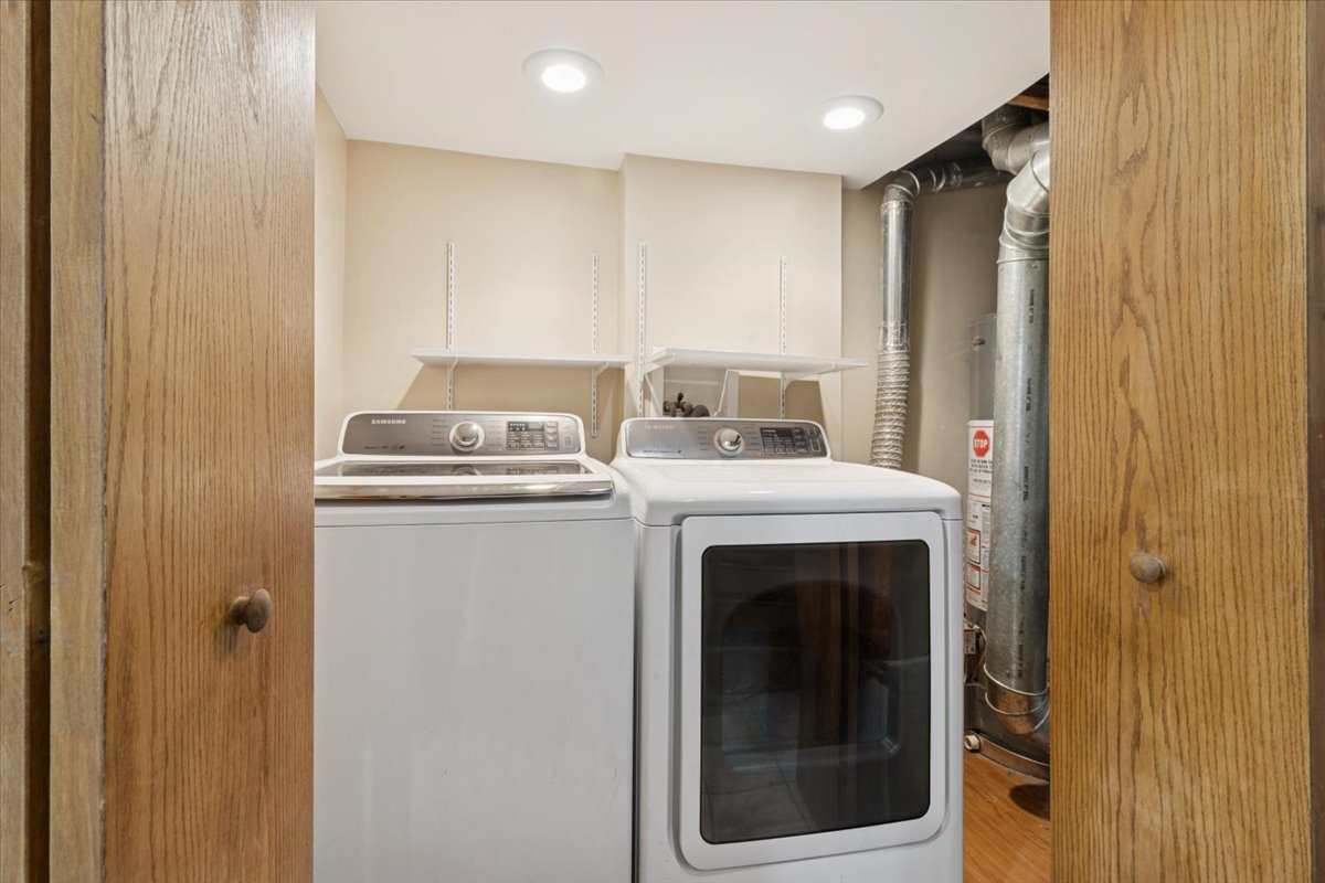 26-w028 Prairie Avenue Wheaton, IL 60187 - Photo 26 of 28 a utility room with dryer and washer