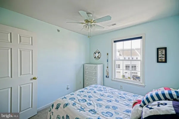 a bathroom with a sink a mirror and a toilet