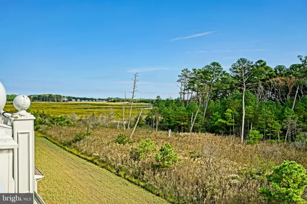 a view of a building with a yard