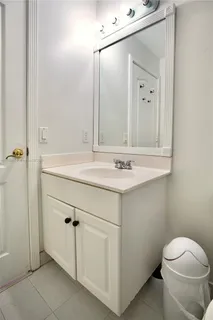 a bath room with a toilet and a bath tub