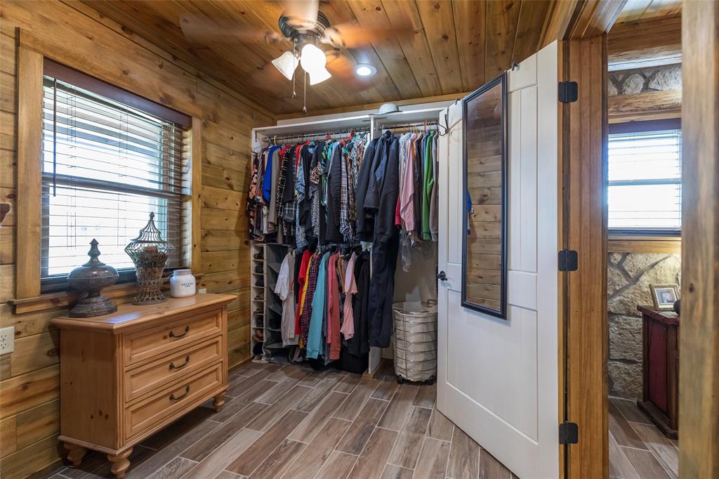 304 South Ave H Avenue Haskell, TX 79521 - Photo 18 of 38 a view of walk in closet with clothes and shoes