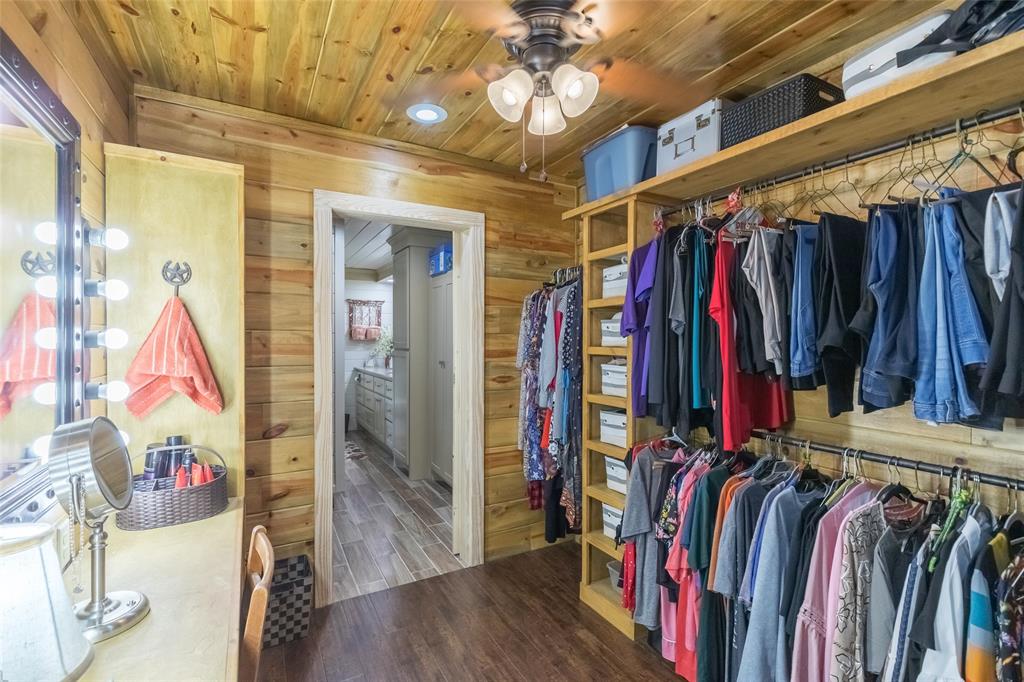 304 South Ave H Avenue Haskell, TX 79521 - Photo 19 of 38 a view of walk in closet with clothes