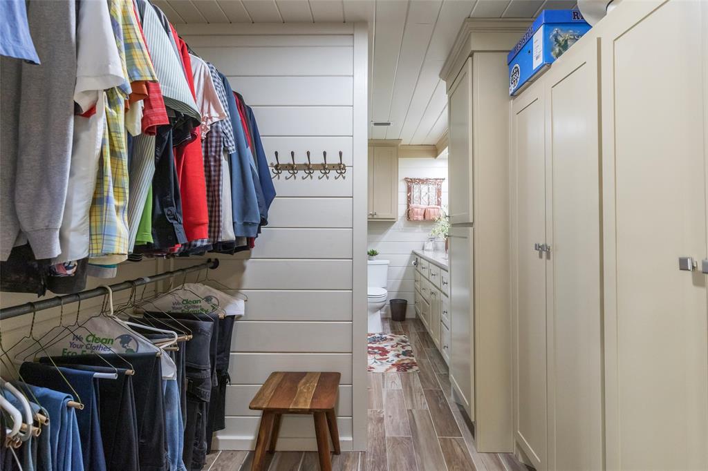 304 South Ave H Avenue Haskell, TX 79521 - Photo 22 of 38 a view of walk in closet with clothes and shoes
