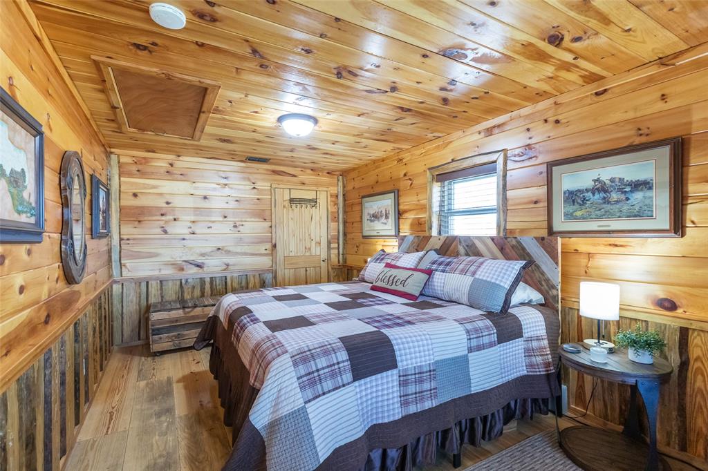 304 South Ave H Avenue Haskell, TX 79521 - Photo 25 of 38 a bedroom with a bed next to a window