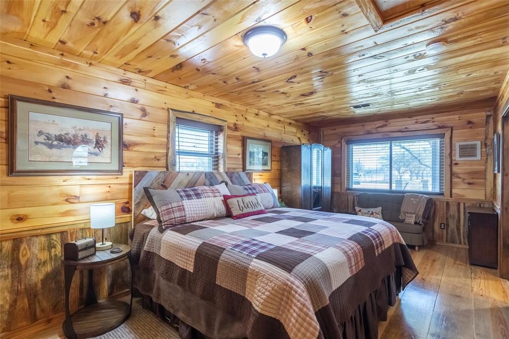 304 South Ave H Avenue Haskell, TX 79521 - Photo 26 of 38 a bedroom with a bed next to a window