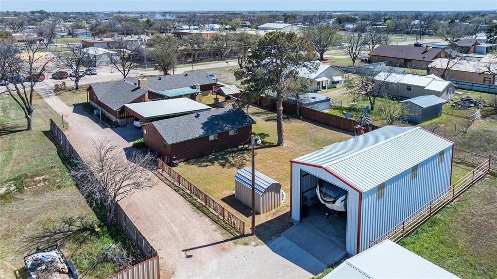 304 South Ave H Avenue Haskell, TX 79521 - Photo 36 of 38 an aerial view of a house with a swimming pool