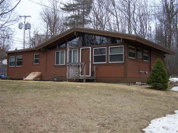 110 Union Road Wales, MA 01081 - Photo 1 of 1 a front view of a house with a yard