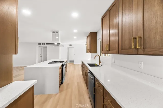 a bathroom with a double vanity sink a mirror and a bathtub