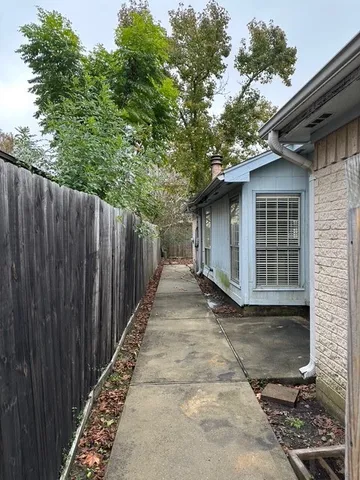 a view of a back yard of the house