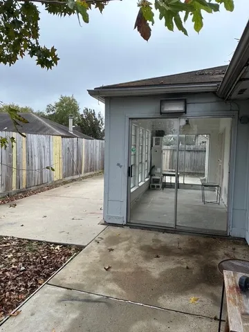 a view of a backyard of the house