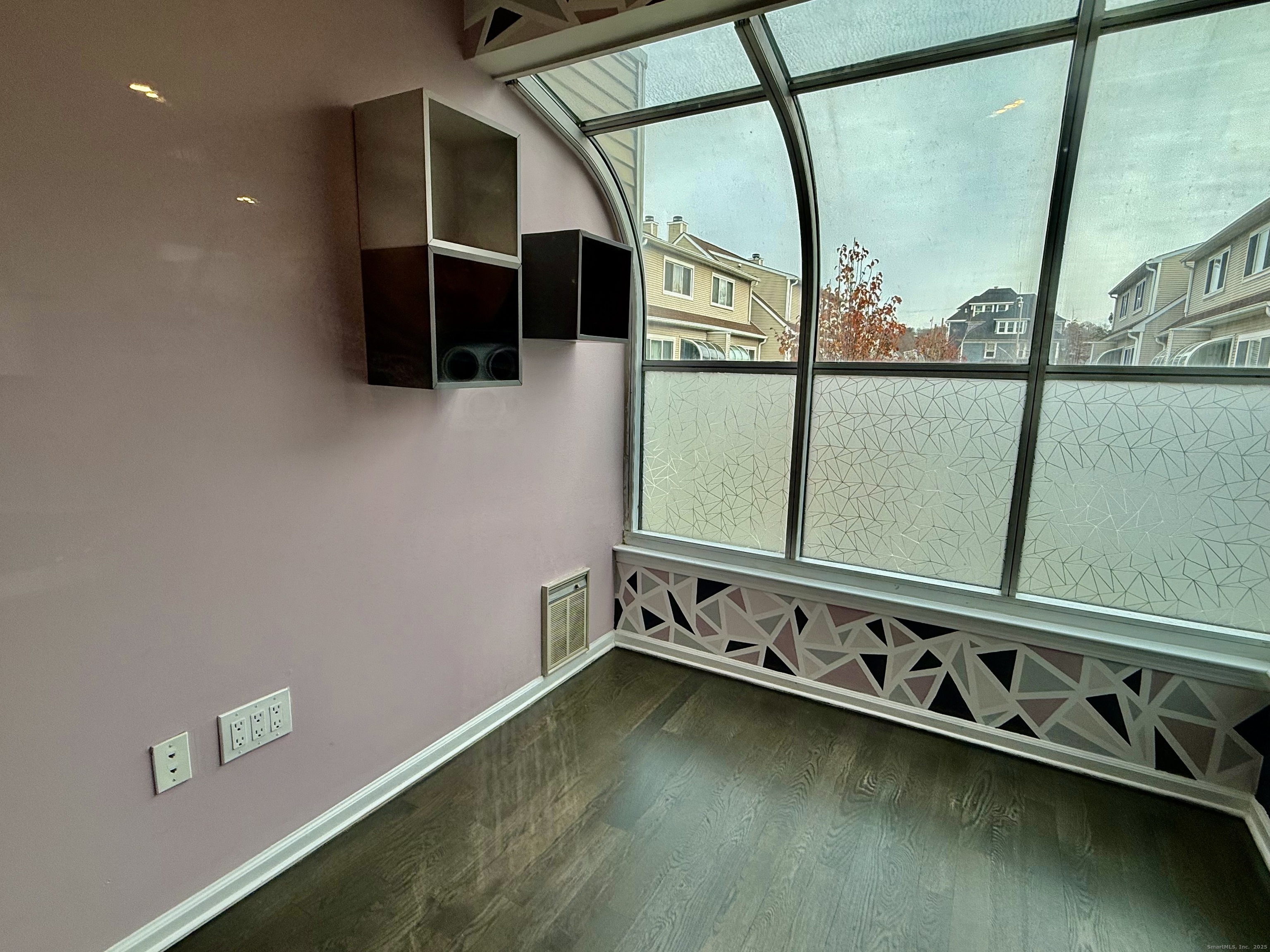 1900 Summer Street, Unit 15 Stamford, CT 06905 - Photo 12 of 34 The Spacious Living Room has access to the Sunroom/ Office