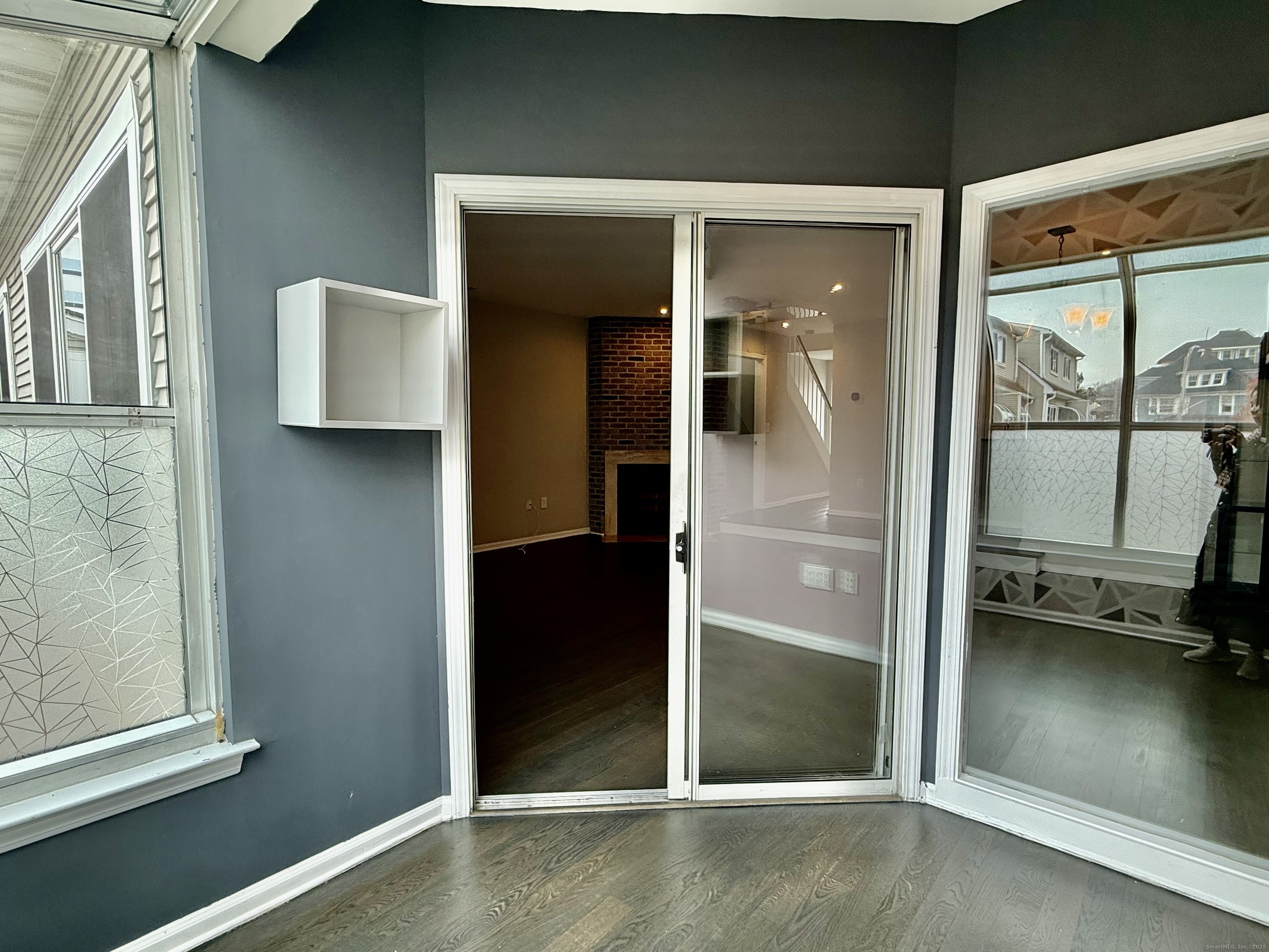 1900 Summer Street, Unit 15 Stamford, CT 06905 - Photo 13 of 34 The Spacious Living Room has access to the Sunroom/ Office