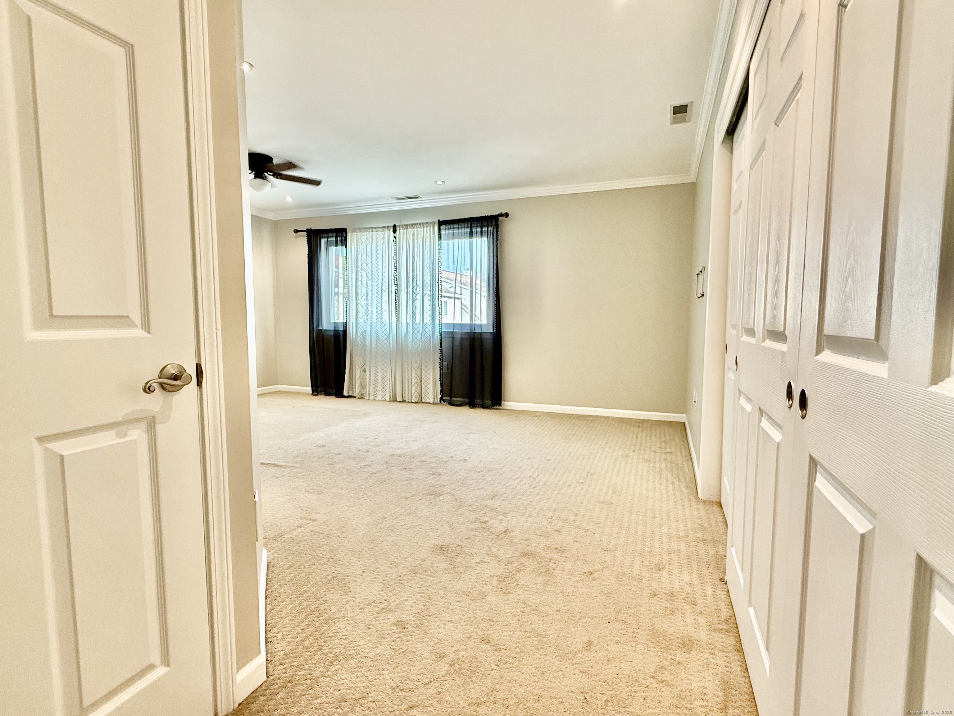 1900 Summer Street, Unit 15 Stamford, CT 06905 - Photo 17 of 34 Primary Bedroom with He and Her Closet