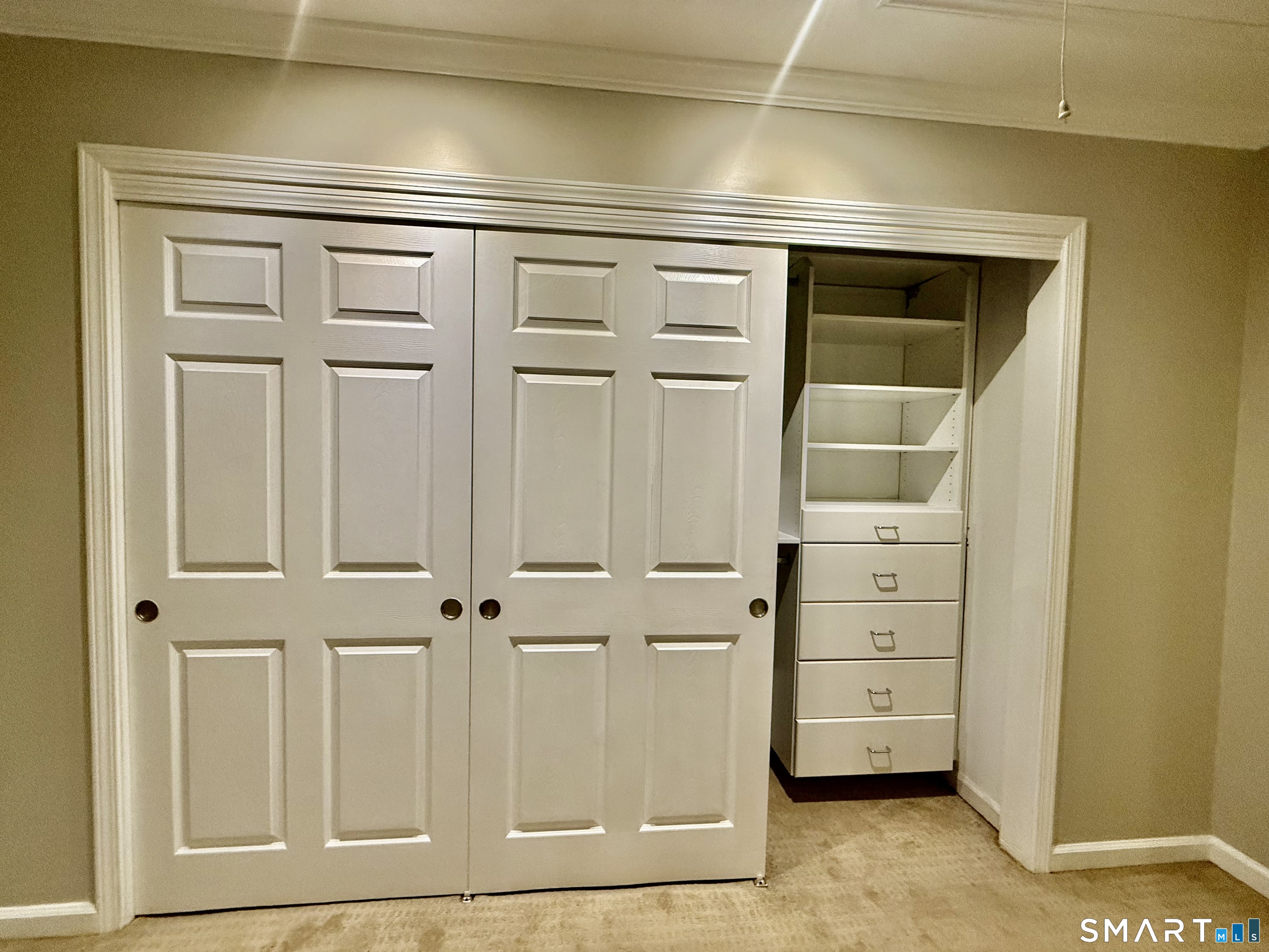 1900 Summer Street, Unit 15 Stamford, CT 06905 - Photo 18 of 34 Primary Bedroom with built in closet