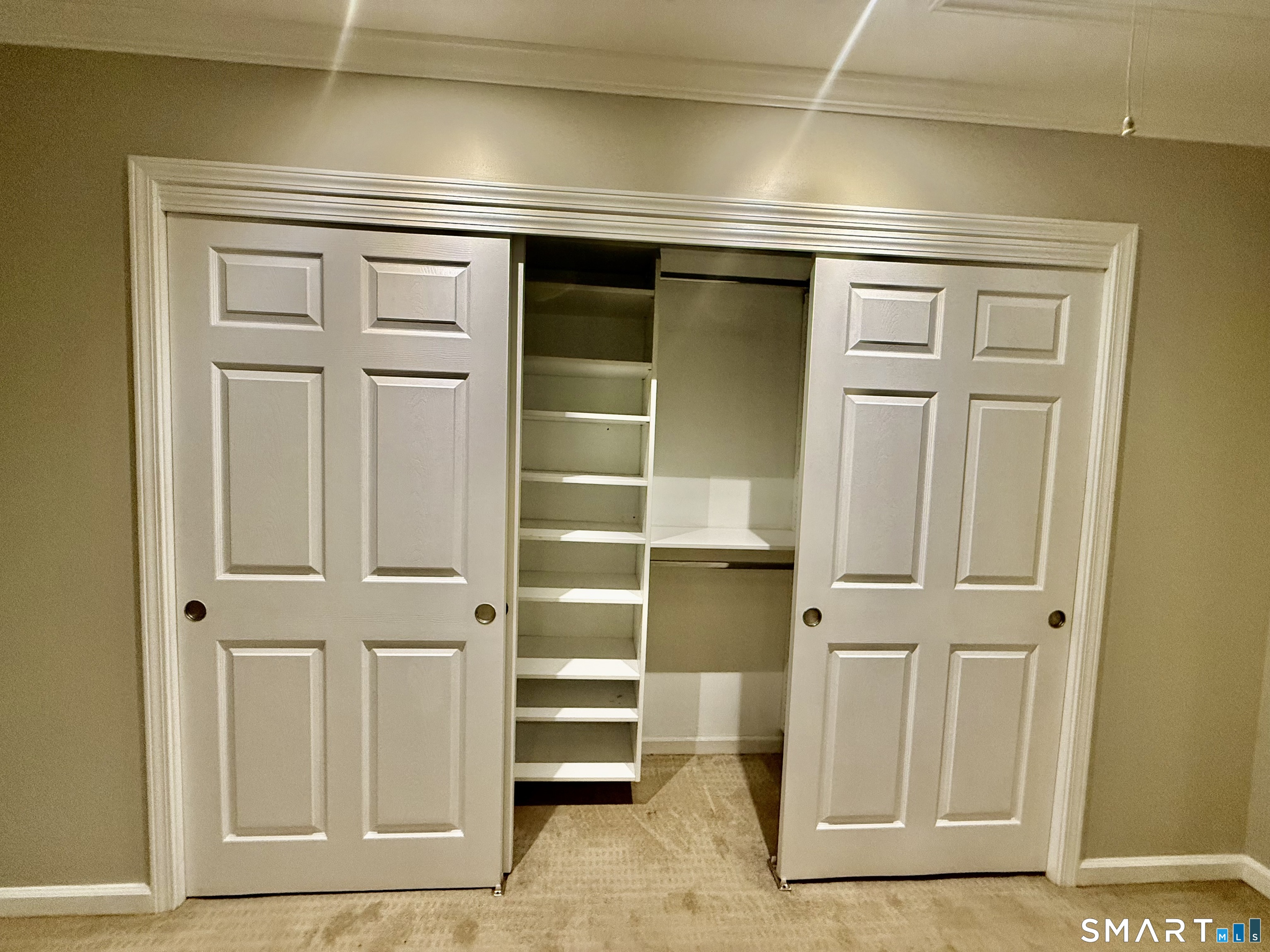 1900 Summer Street, Unit 15 Stamford, CT 06905 - Photo 19 of 34 Primary Bedroom with built in closet