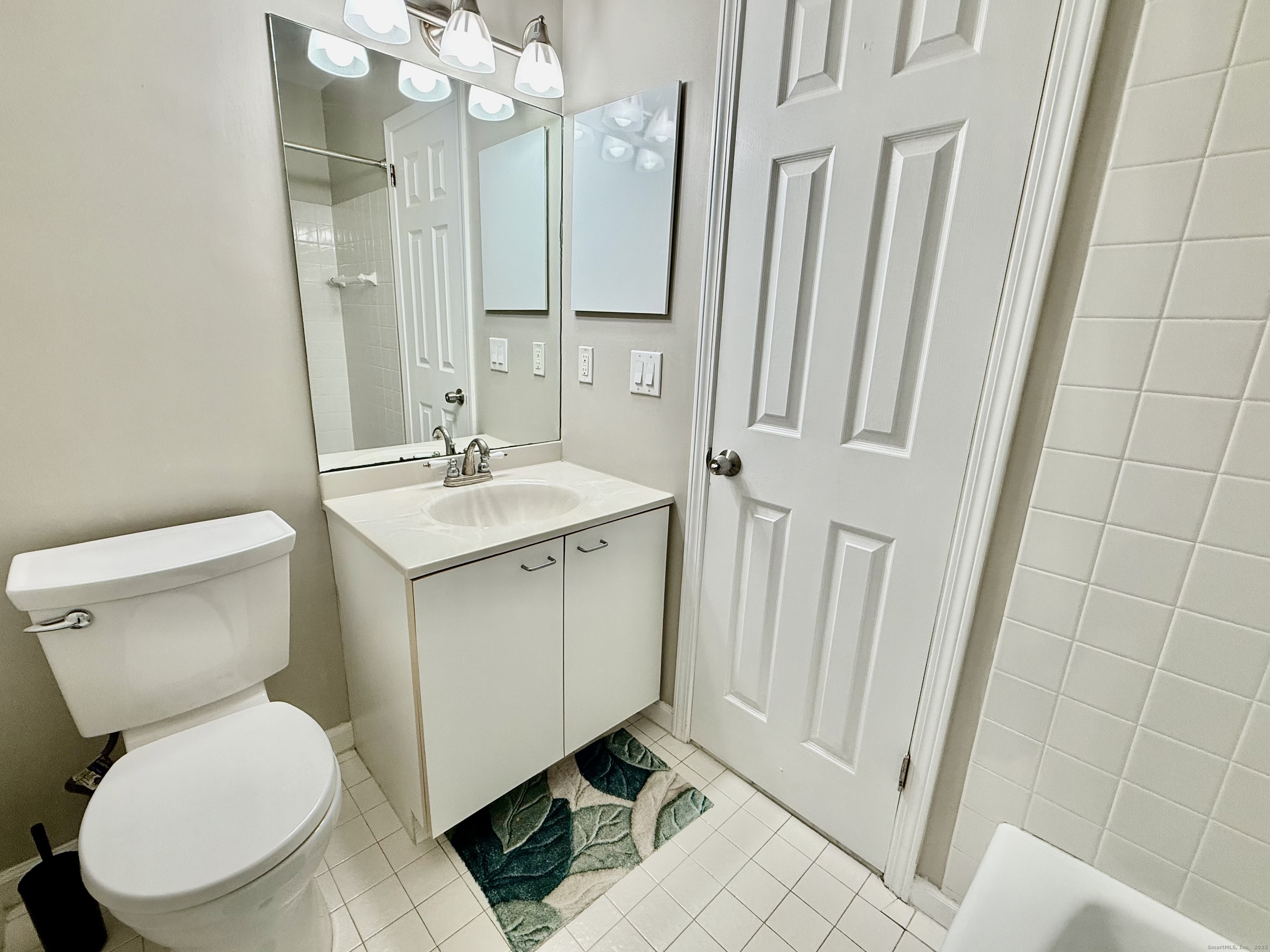 1900 Summer Street, Unit 15 Stamford, CT 06905 - Photo 28 of 34 2nd Bedroom: Ensuite Bedroom with Full Bath and Walk-In Closet