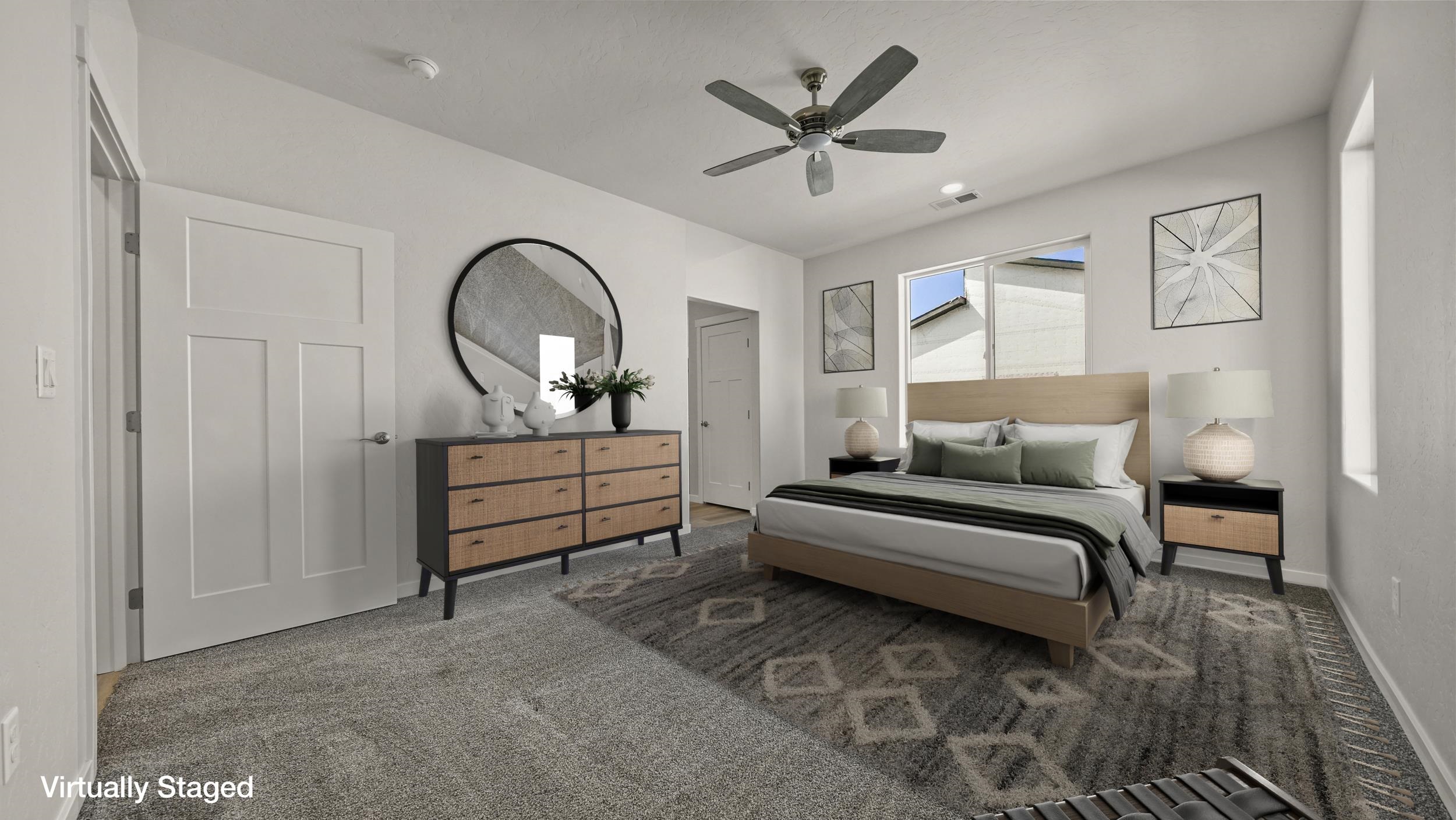 1705 Tungsten Way Fruita, CO 81521 - Photo 16 of 34 a living room with furniture a rug and a window
