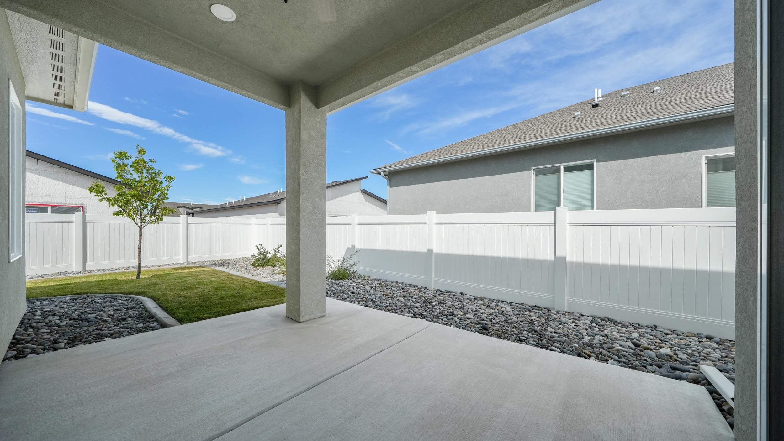 1705 Tungsten Way Fruita, CO 81521 - Photo 27 of 34 a house with a yard