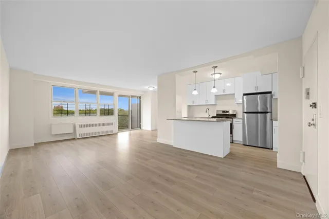 a view of kitchen with wooden floor