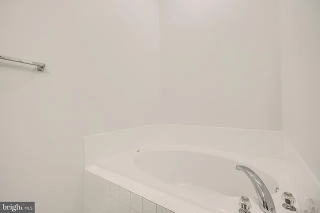 a view of a houses from a balcony