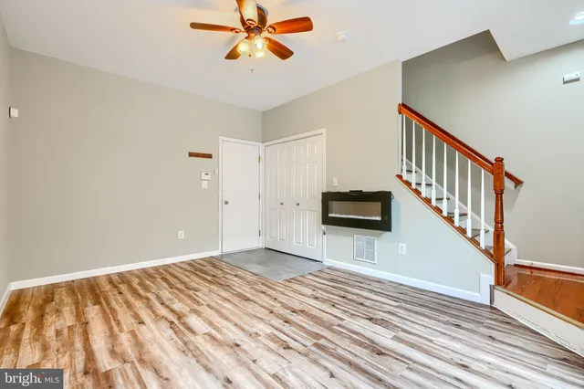 a view of a hallway view with staircase