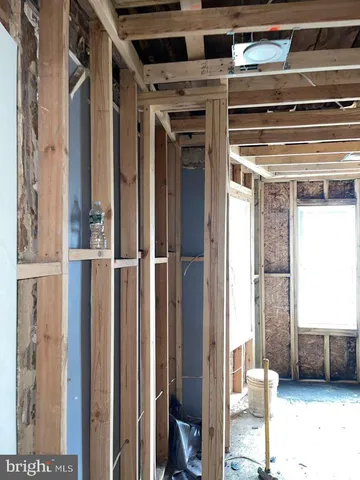 a view of a hallway with outdoor seating