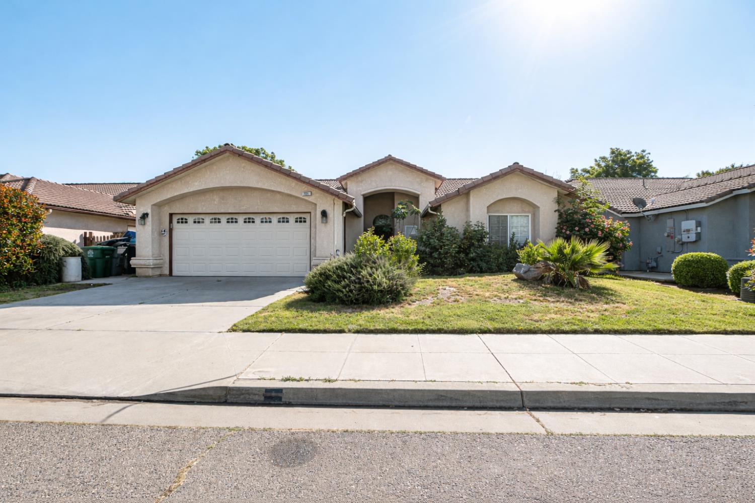 721 Via Cerioni Madera, CA 93637 - Photo 1 of 24 a front view of a house with a yard