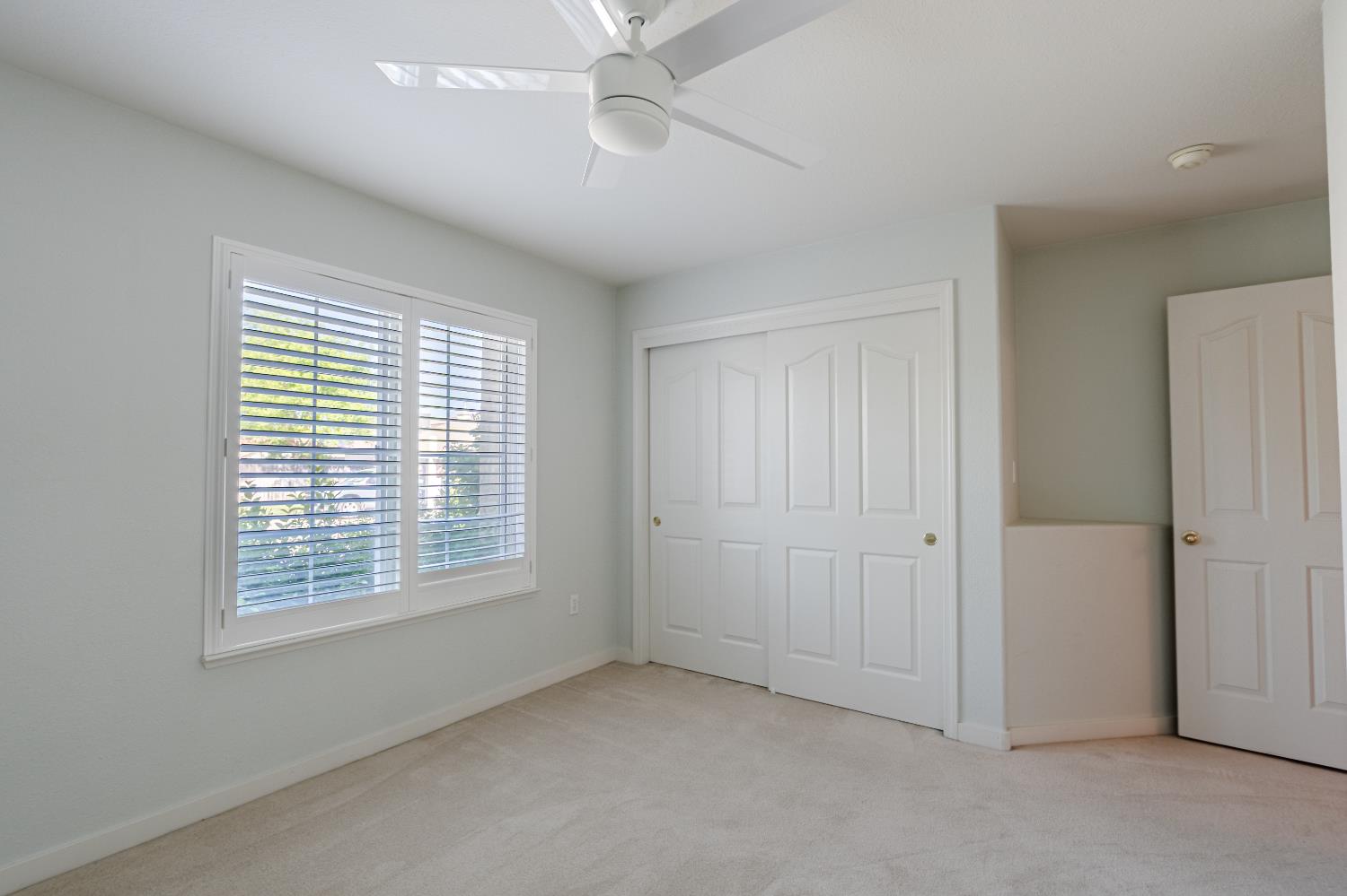 721 Via Cerioni Madera, CA 93637 - Photo 19 of 24 a view of an empty room with a window