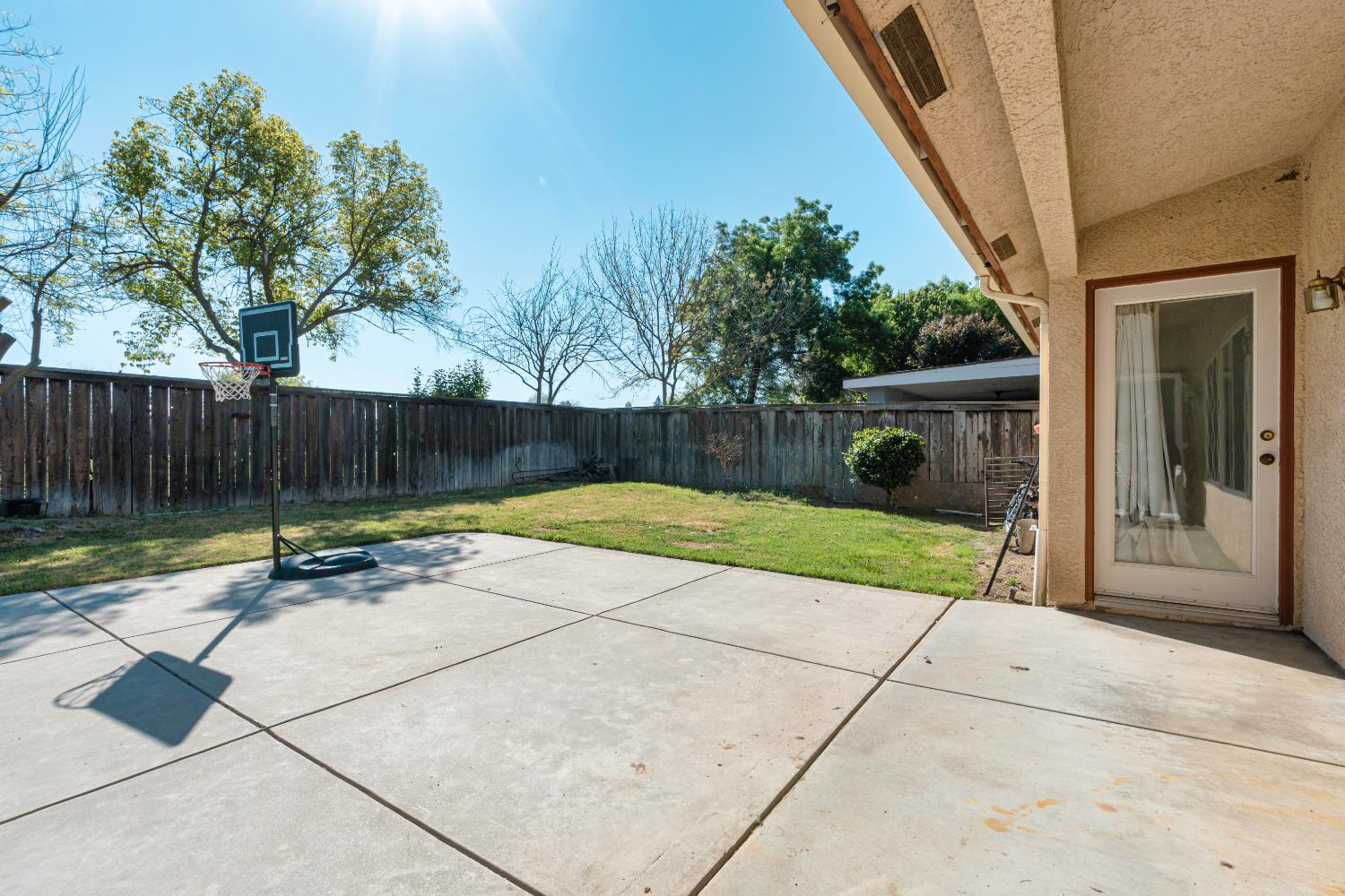 721 Via Cerioni Madera, CA 93637 - Photo 23 of 24 a view of a backyard with a slide