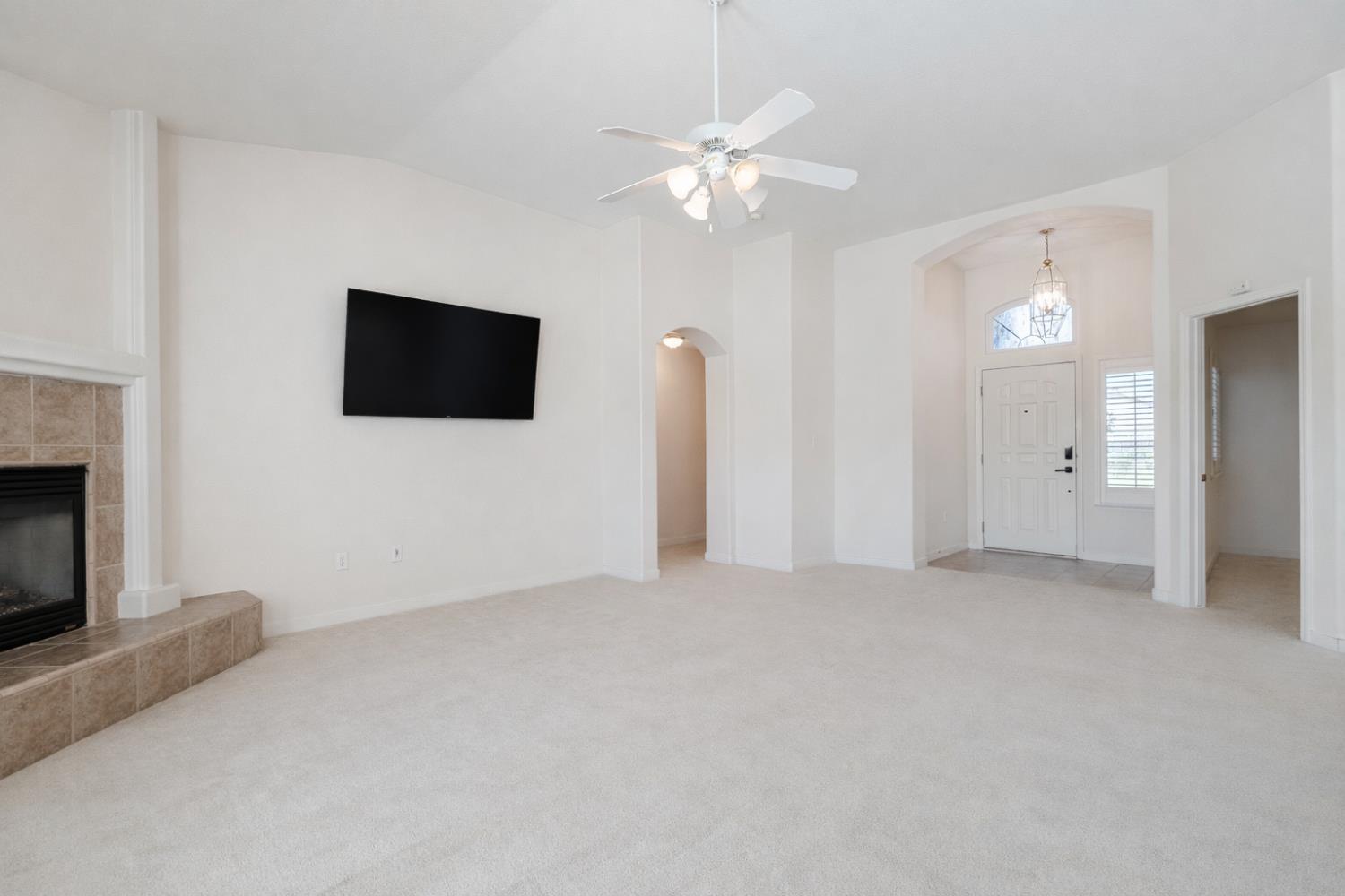 721 Via Cerioni Madera, CA 93637 - Photo 5 of 24 a view of a livingroom with a flat screen tv