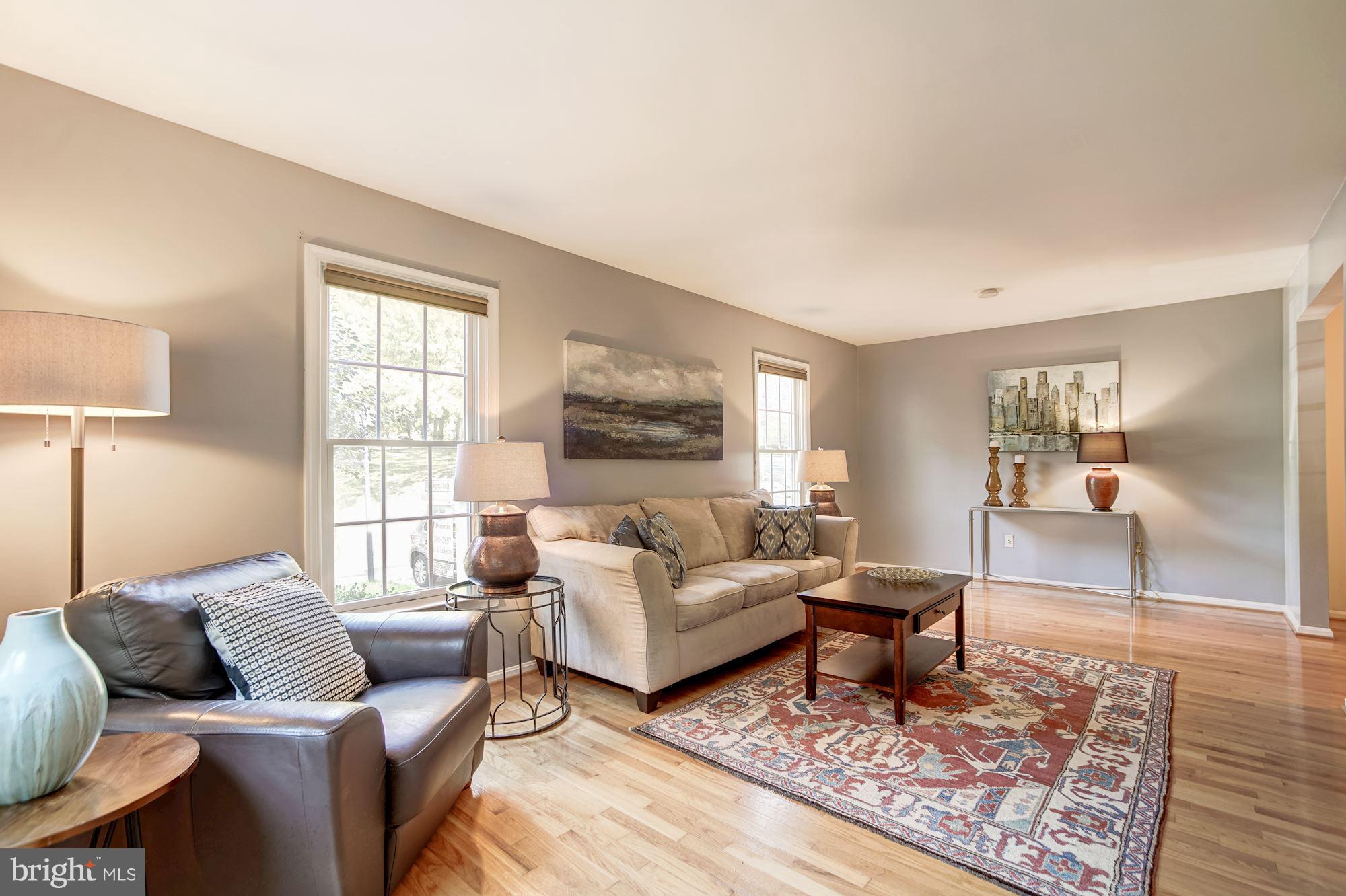7320 Spring View Court Springfield, VA 22153 - Photo 2 of 30 Living room with gorgeous hardwood floor.