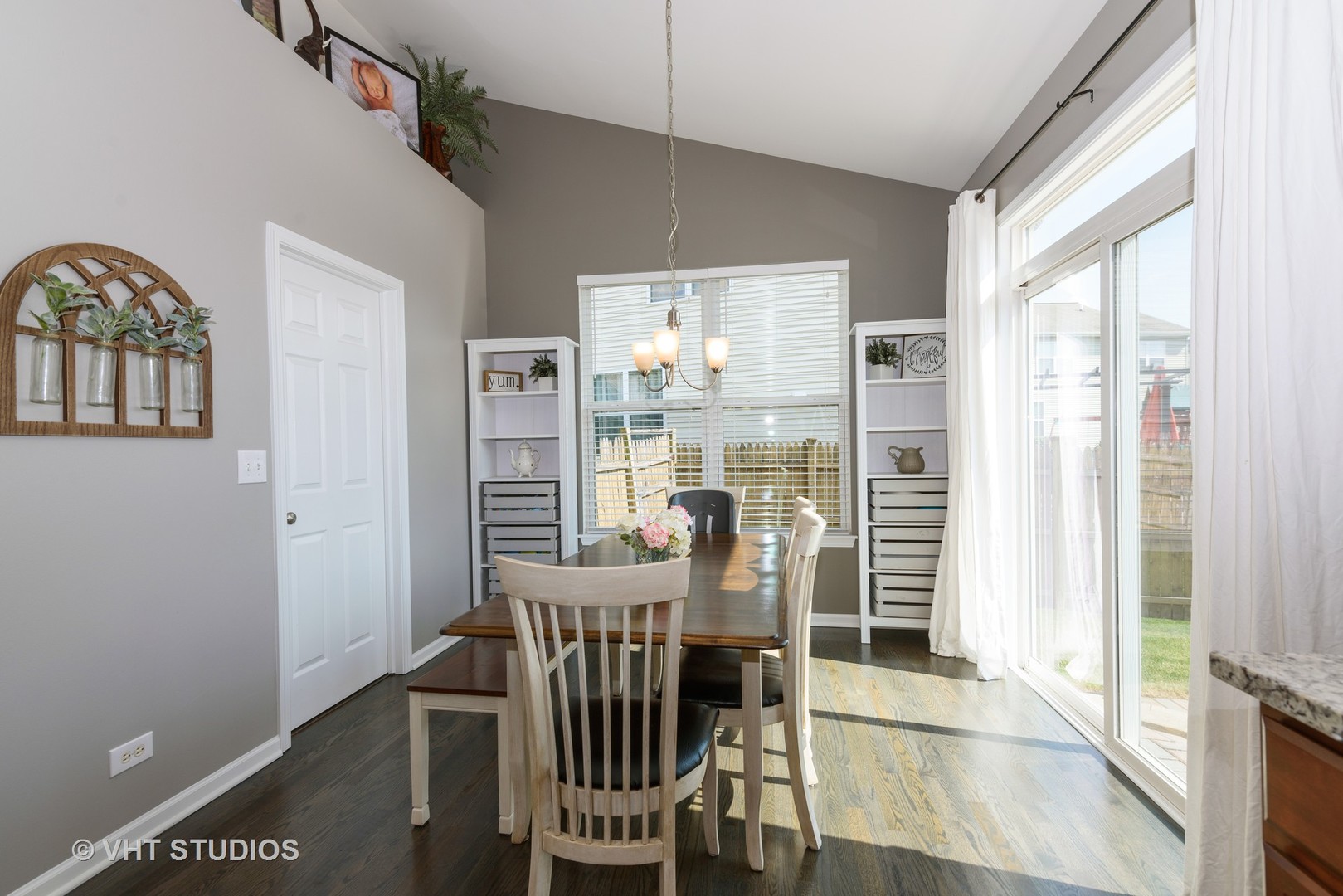 858 Oak Ridge Boulevard Elgin, IL 60120 - Photo 9 of 16 a view of a dining room with furniture and a window