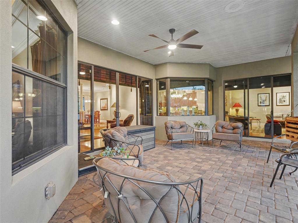 339 Corbett Road Lithia, FL 33547 - Photo 19 of 38 a living room with furniture and large windows