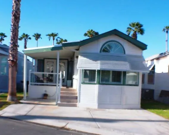 a front view of a house with a porch