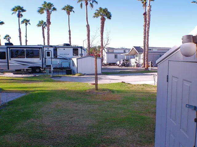 a view of backyard with tub