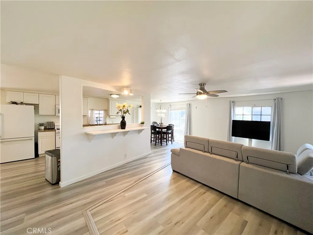 17700 Avalon, Unit 40 Carson, CA 90746 - Photo 11 of 33 a living room with furniture and a flat screen tv