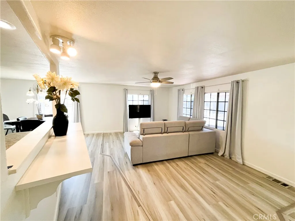17700 Avalon, Unit 40 Carson, CA 90746 - Photo 10 of 33 a living room with furniture and a flat screen tv
