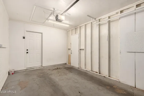 a view of a bathroom with a shower and a tub