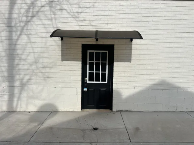 a front view of a house with garage