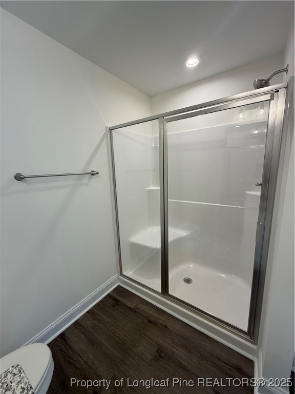 81 Reece Drive Sanford, NC 27332 - Photo 11 of 18 a bathroom with a glass shower door
