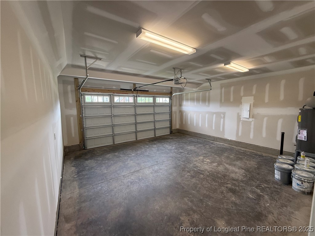 81 Reece Drive Sanford, NC 27332 - Photo 14 of 18 a view of a room with gym equipment