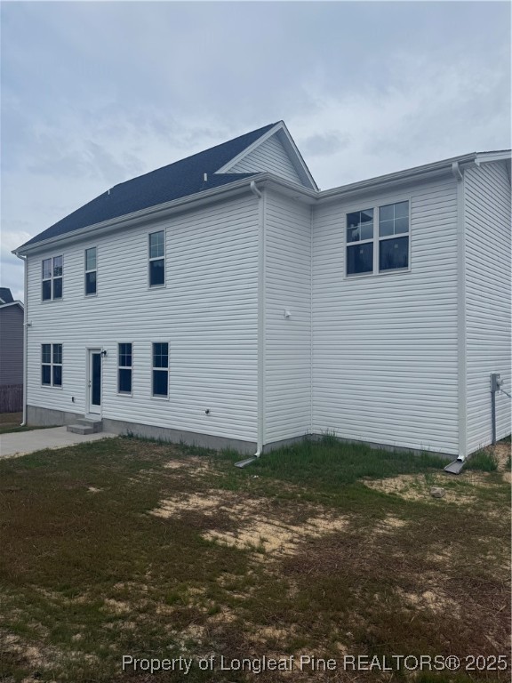 81 Reece Drive Sanford, NC 27332 - Photo 15 of 18 a view of a house with backyard