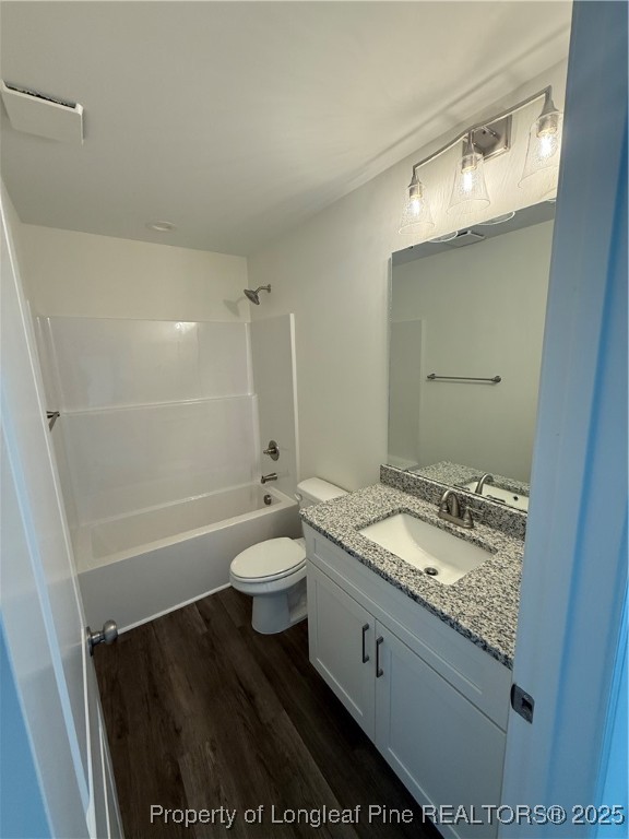 81 Reece Drive Sanford, NC 27332 - Photo 16 of 18 a bathroom with a granite countertop sink a toilet and shower