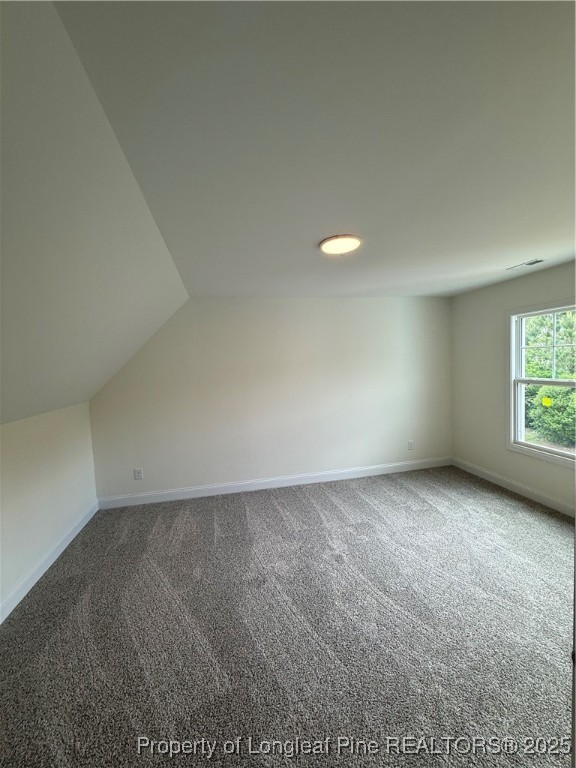 81 Reece Drive Sanford, NC 27332 - Photo 18 of 18 an empty room with windows