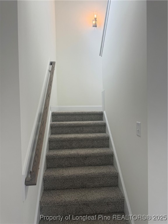 81 Reece Drive Sanford, NC 27332 - Photo 2 of 18 a view of staircase with white walls