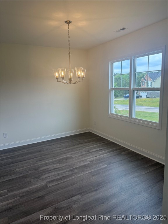 81 Reece Drive Sanford, NC 27332 - Photo 3 of 18 wooden floor in an empty room with a window