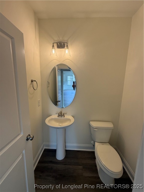 81 Reece Drive Sanford, NC 27332 - Photo 8 of 18 a bathroom with a toilet