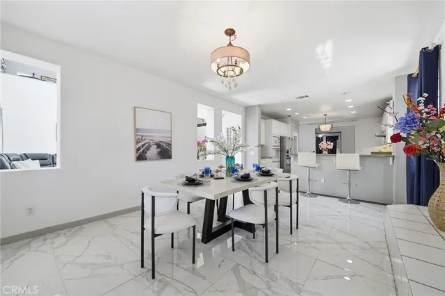 a view of a dining room with furniture