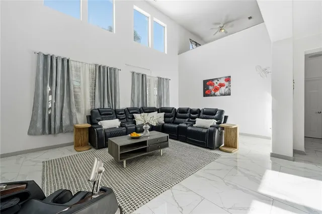 a living room with furniture and a couch